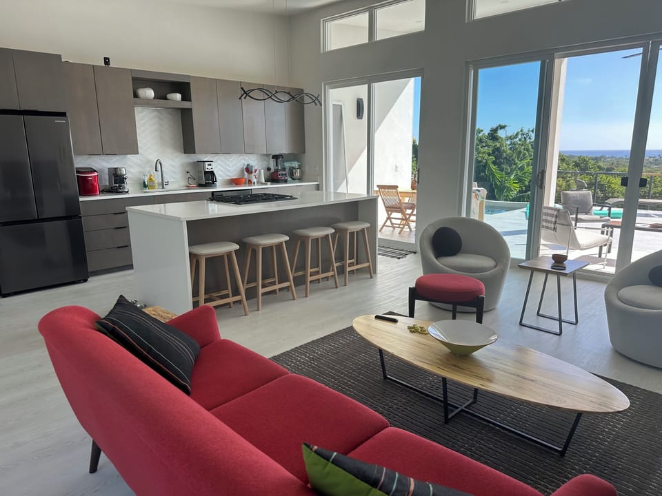 Open concept living with 8 foot tall sliders.