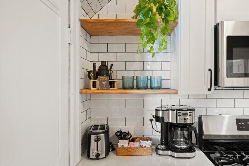 Kitchen equipped with coffee maker, toaster, blender and more!
