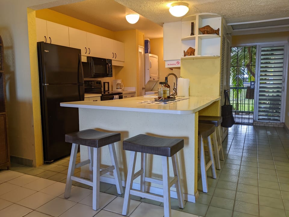 A full kitchen opens to the living room
 Counter seating for 4.