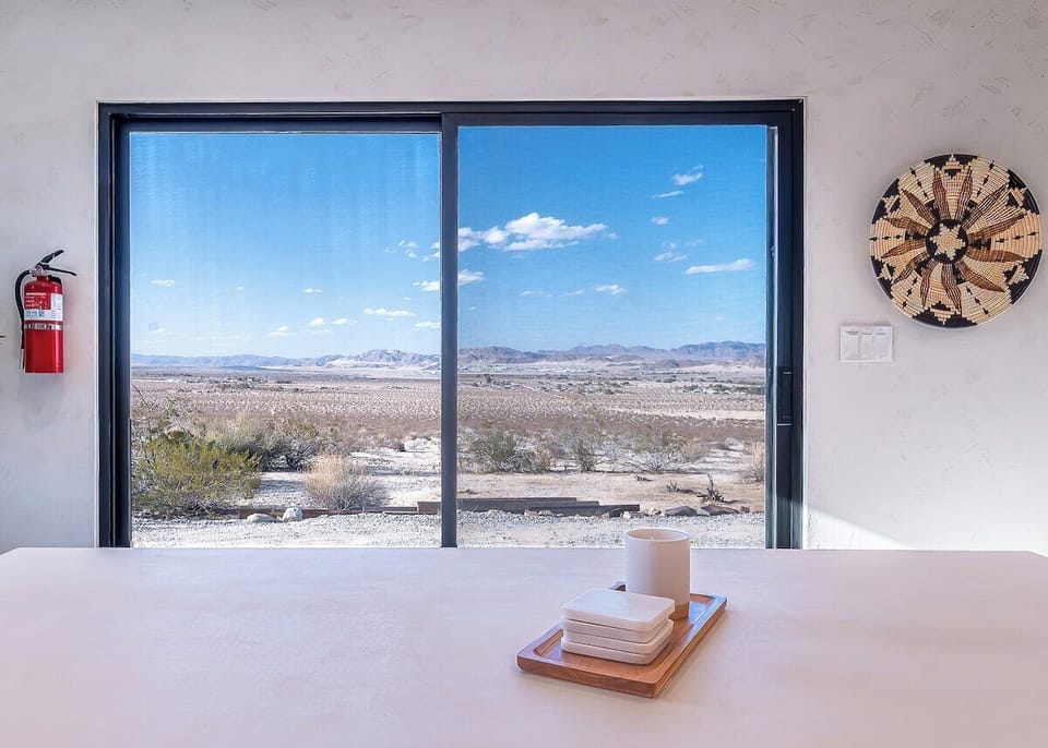 Take in the stunning desert scenery while enjoying a meal or working remote at our dining room table.