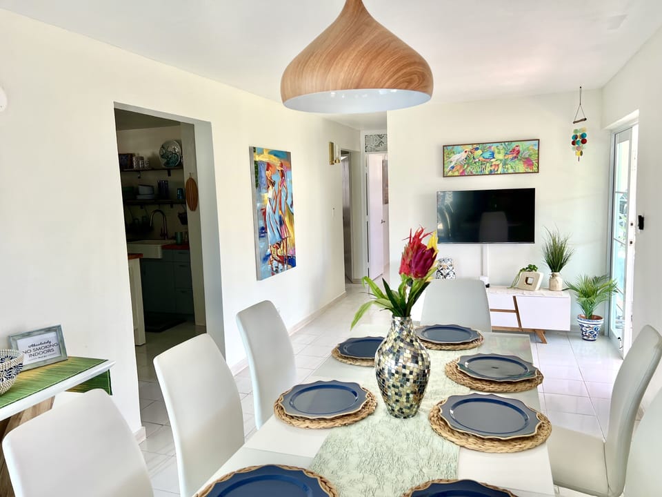 Dinning room close to bathroom, terrace, kitchen and 2 beds