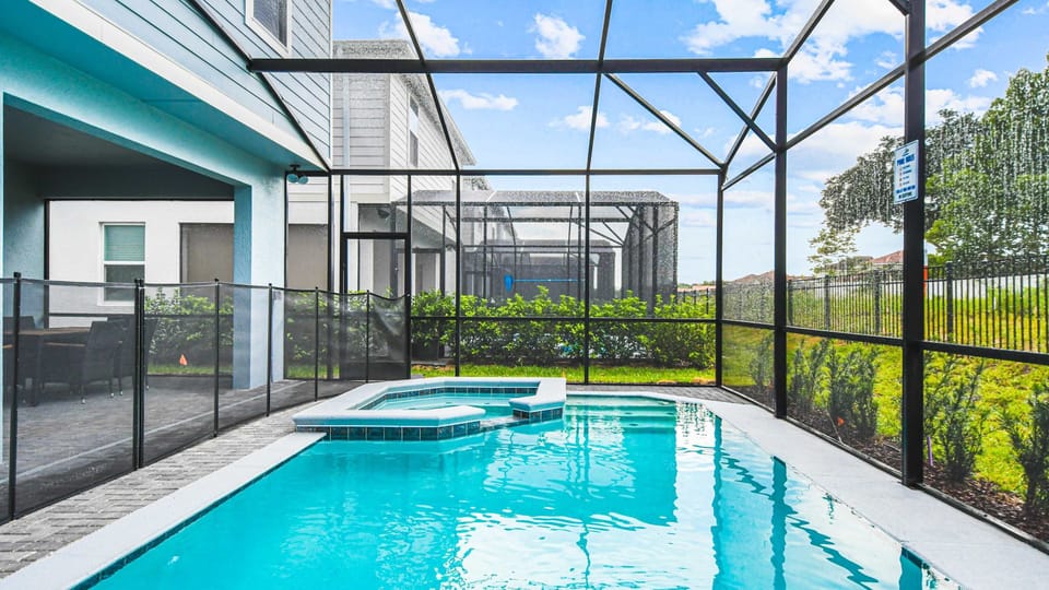Relax in your private screened pool and spa—perfect for sunny days and nights!