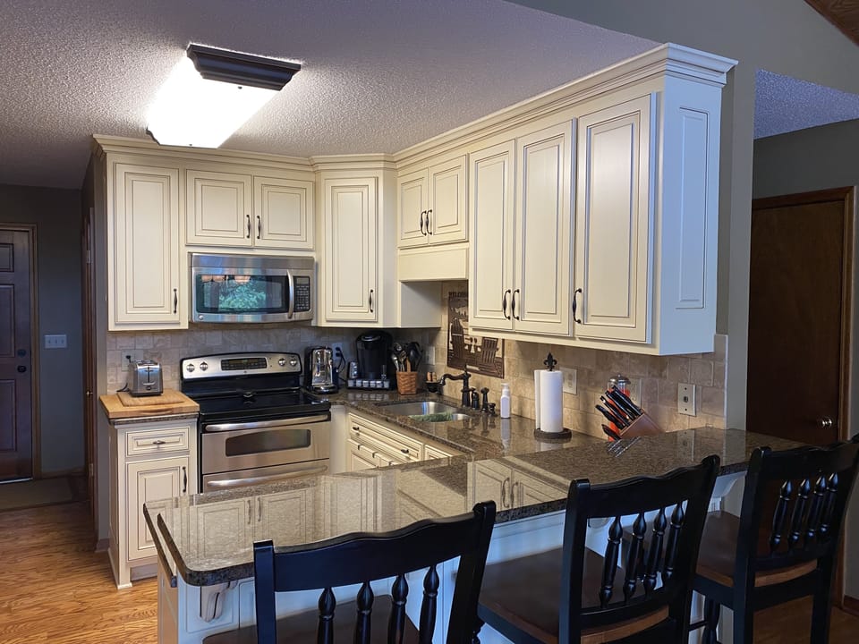 Full-size kitchen with everything you should need to cook. Gas grill on deck.