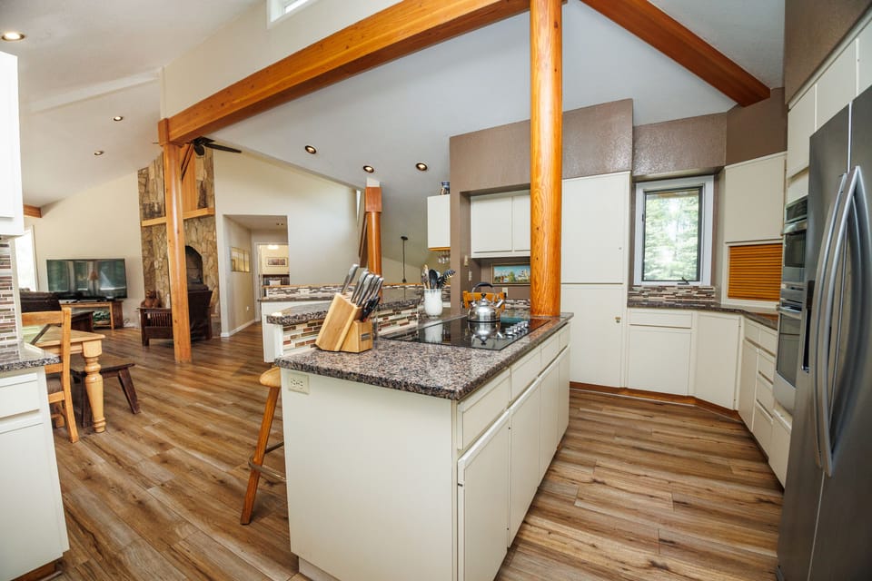 The in-counter glass top stove makes for convenient cooking