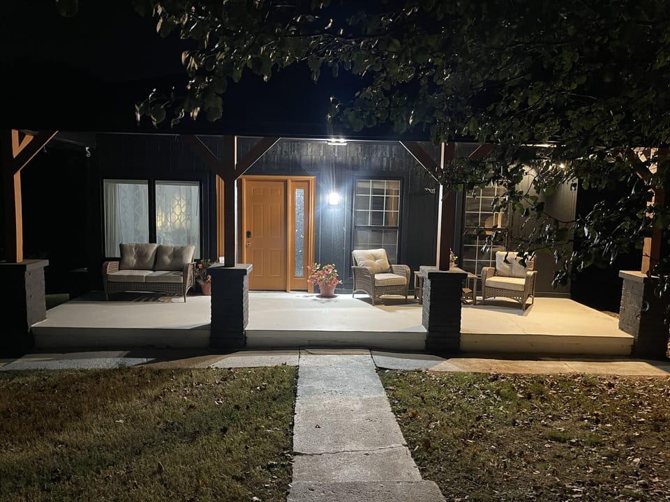 Relax on the front porch on your vacation stay