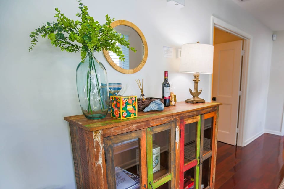All of the bedrooms have wood flooring with rugs.