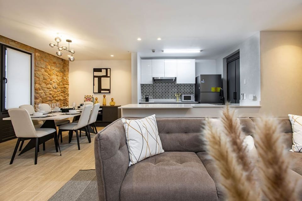 Sala de estar con sofa / Living area with sofa 