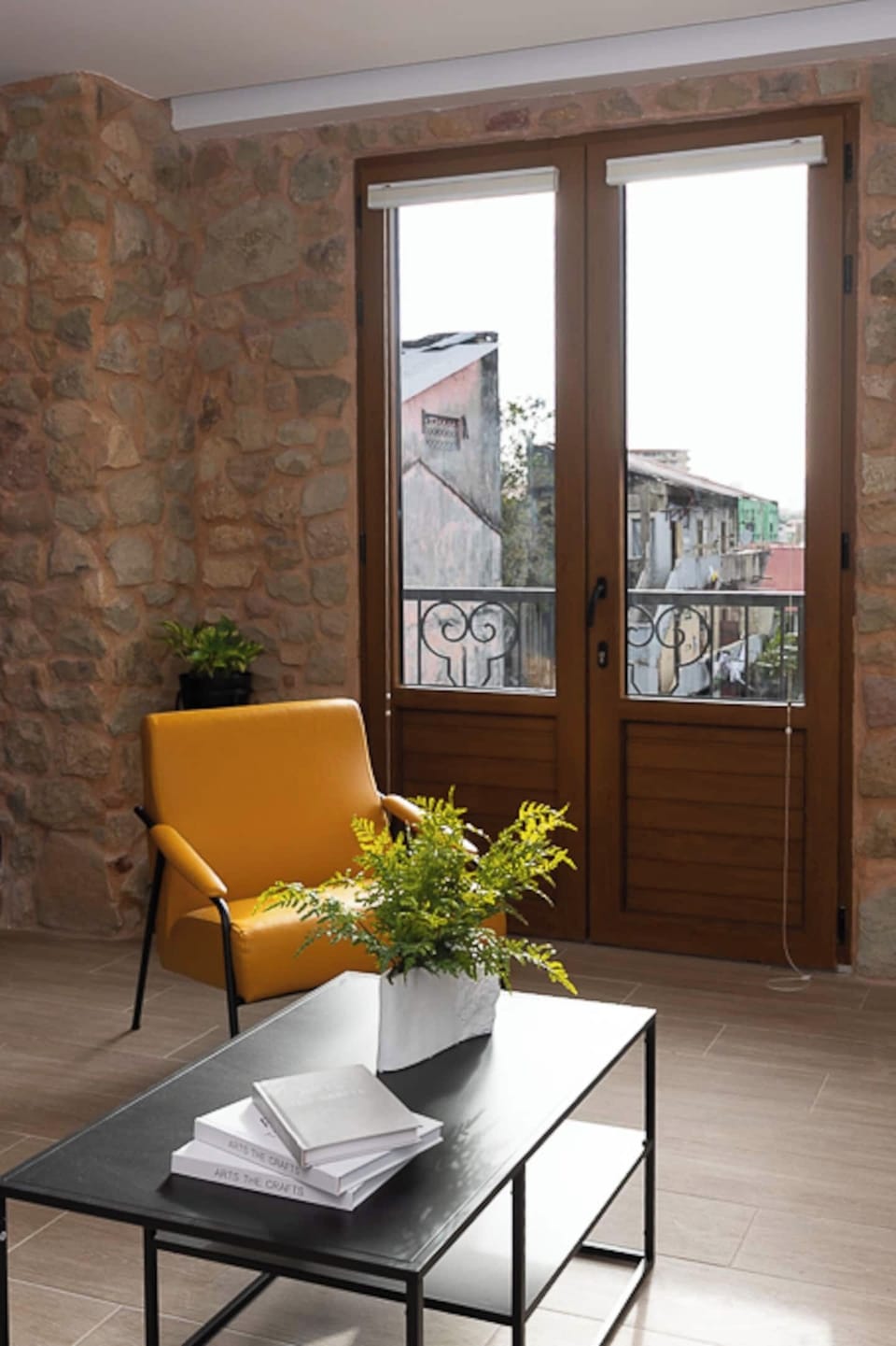 The apartment has a balcony door with glass that allows natural light to wash the room