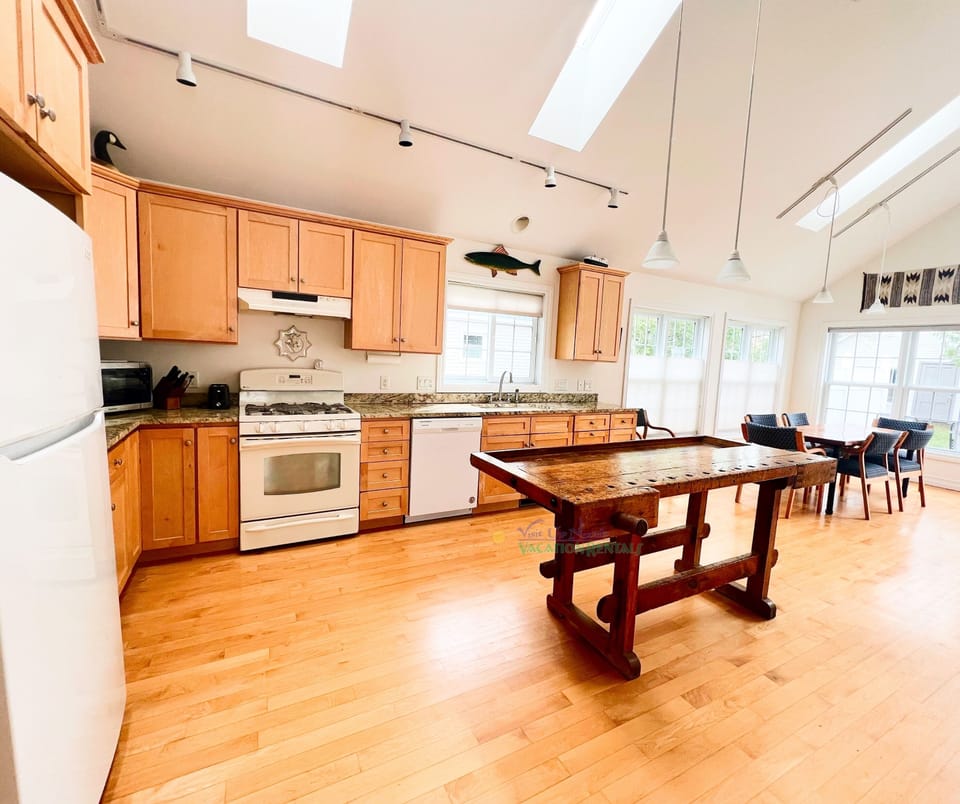 Kitchen with open living and dining area. - Kitchen with open living and dining area.