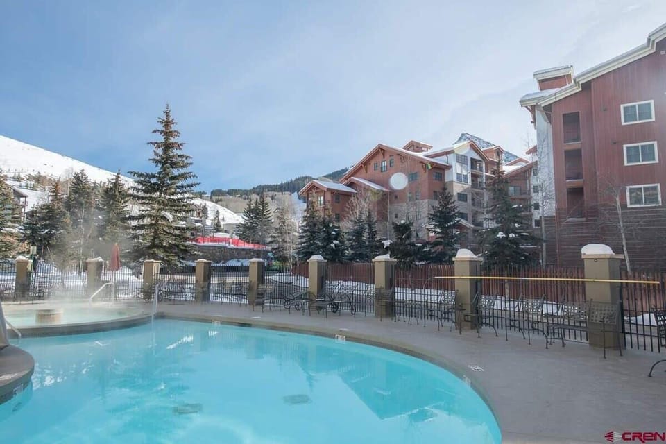 ⓧ REMOVE (redundant) — Snowy, Steamy, Relaxing Winters w/ the Heated Pool & Hot Tub | Managed by: @TraverseHospitality