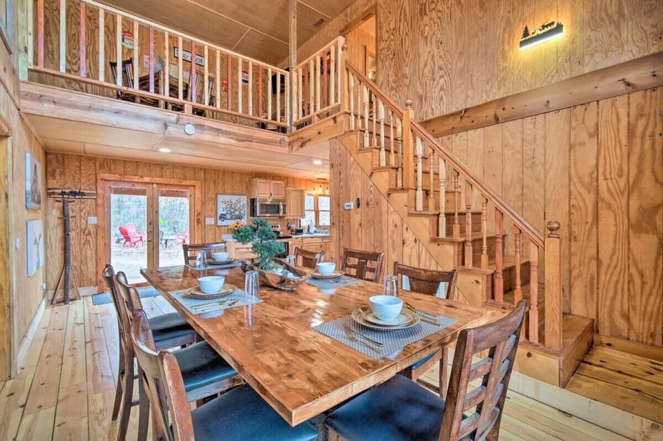 Savor hearty meals in the spacious dining area, featuring a large dining table that comfortably seats up to 8 guests.