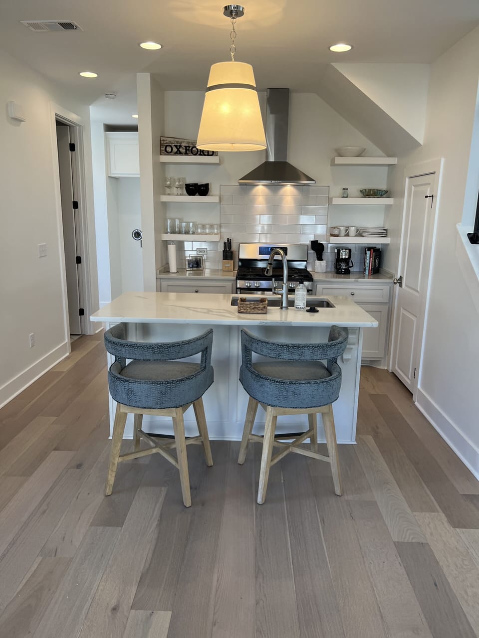 Fully stocked kitchen with double oven and Viking stove. 