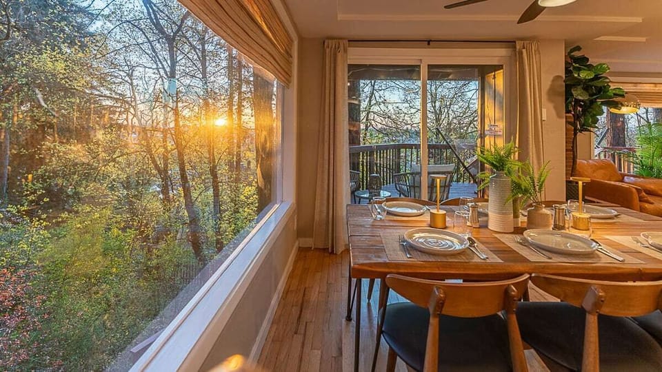 Dining area with big windows and tons of natural light