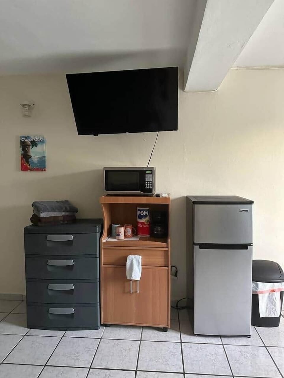 Inside the room is equipped with  small fridge with a microwave & coffee pot. A 43 inches Smart TV with all streaming.