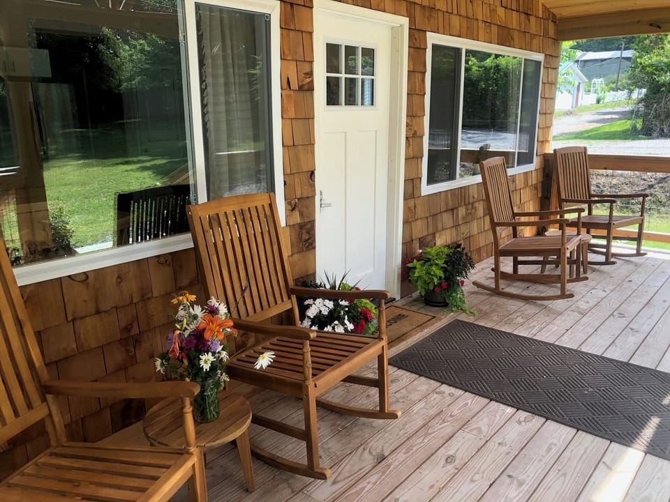 Enjoy the rocking chairs on the covered front porch 