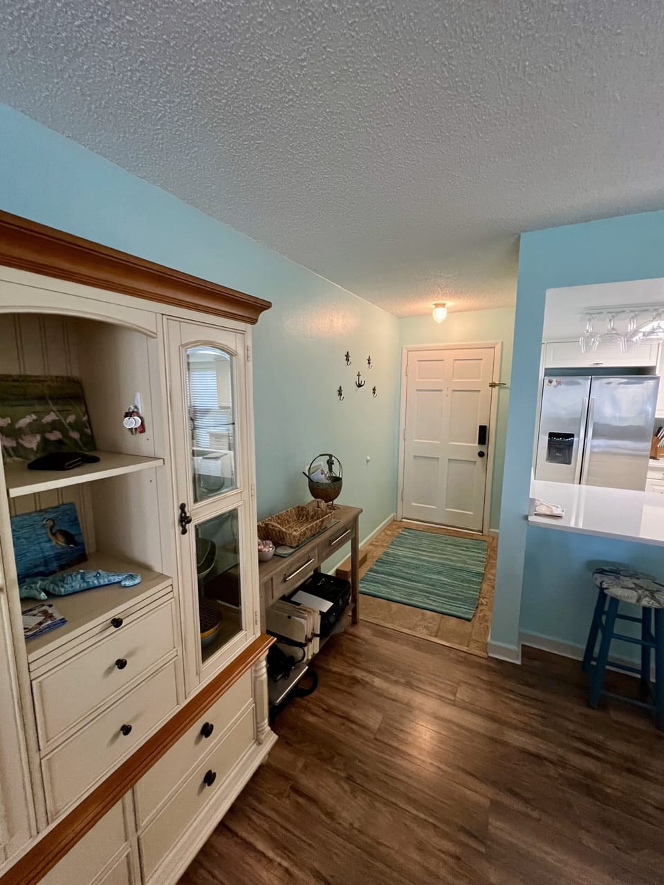Entryway into open concept condo.