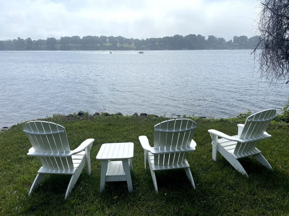 Adirondack chairs and lounge chairs spread throughout the 2 acre property.Plus extra chairs in the basement to bring outside, if you host a few guests for the campfire. Big beach towels, outdoor patio furniture with umbrella. Gas propane grill.