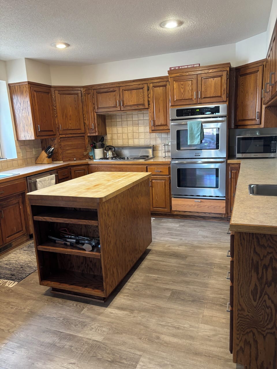 new appliances in the kitchen- stove and refridgerator