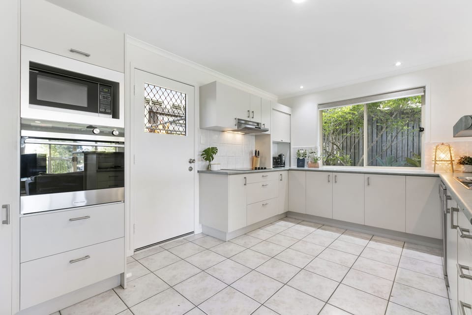 Fully equipped kitchen with ample bench space and storage