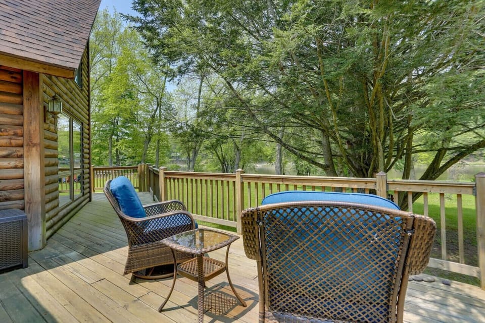 Deckchairs outside master bedroom with view of river, adjacent to the large jacuzzi