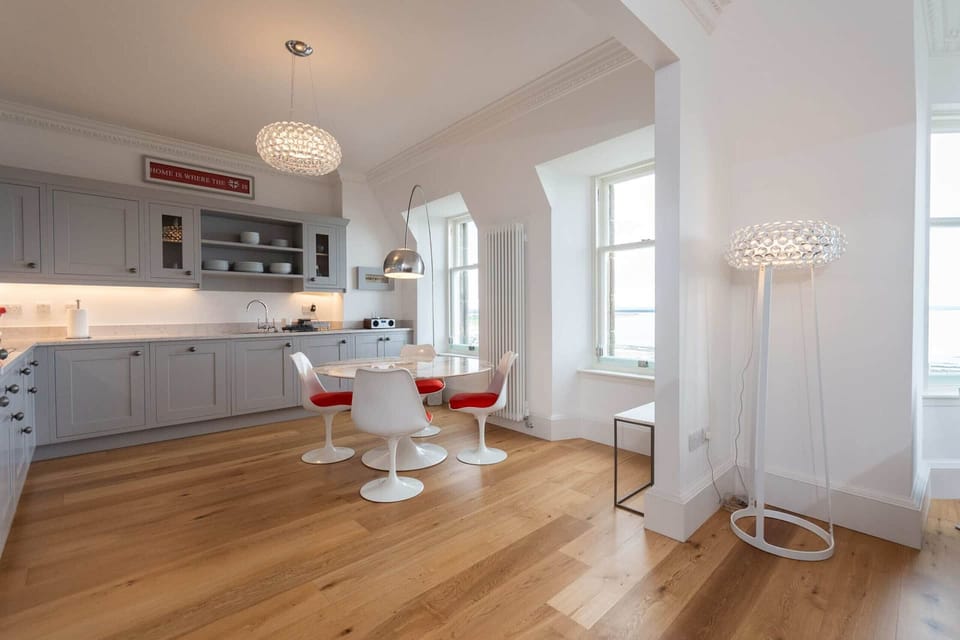 Bright kitchen area at 30c The Scores offering beautiful views over West Sands Beach and the St Andrews coastline