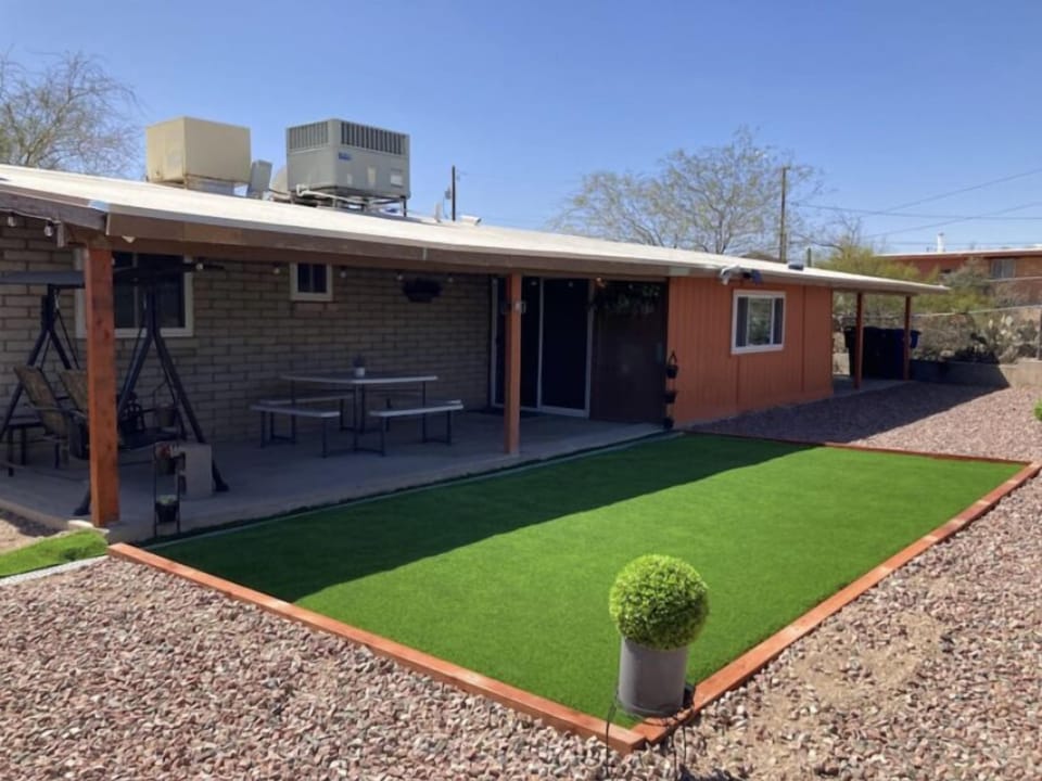 Back left fenced in patio. 