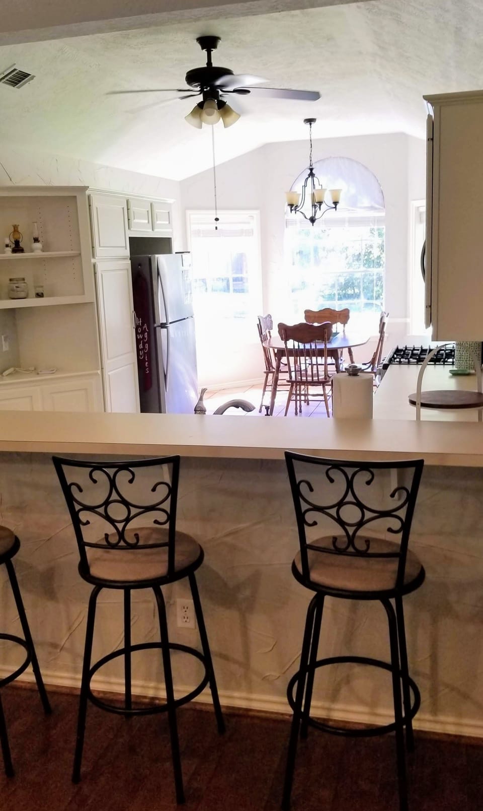 Spacious kitchen for food & fun! Dining table & 4 chairs; Bar seating for 3