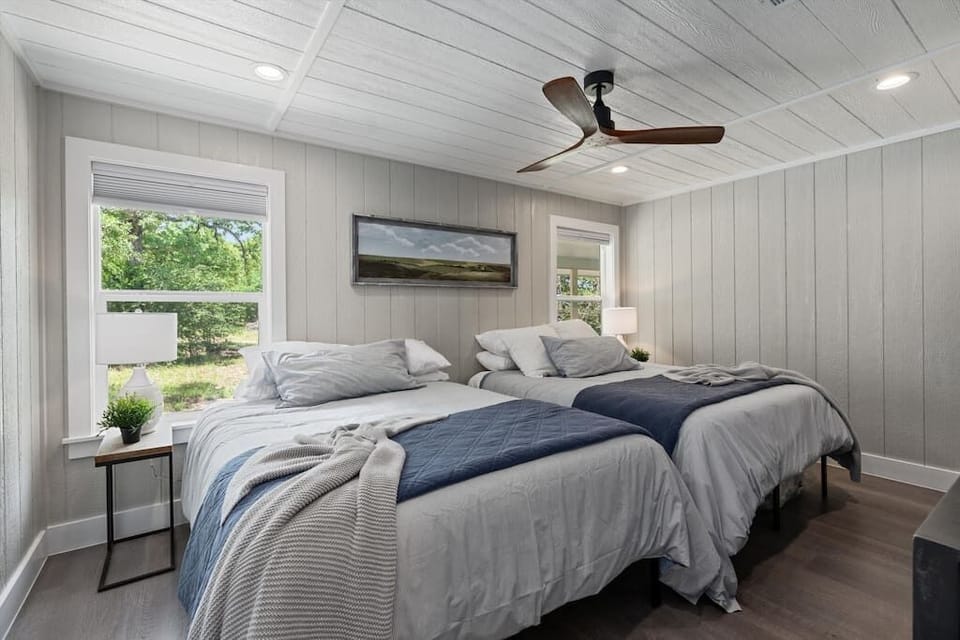 Bedroom #3 features two double beds.