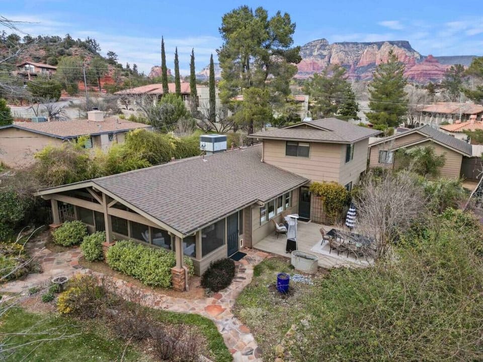 Aerial view shows how close the home is to exceptional red rock formations