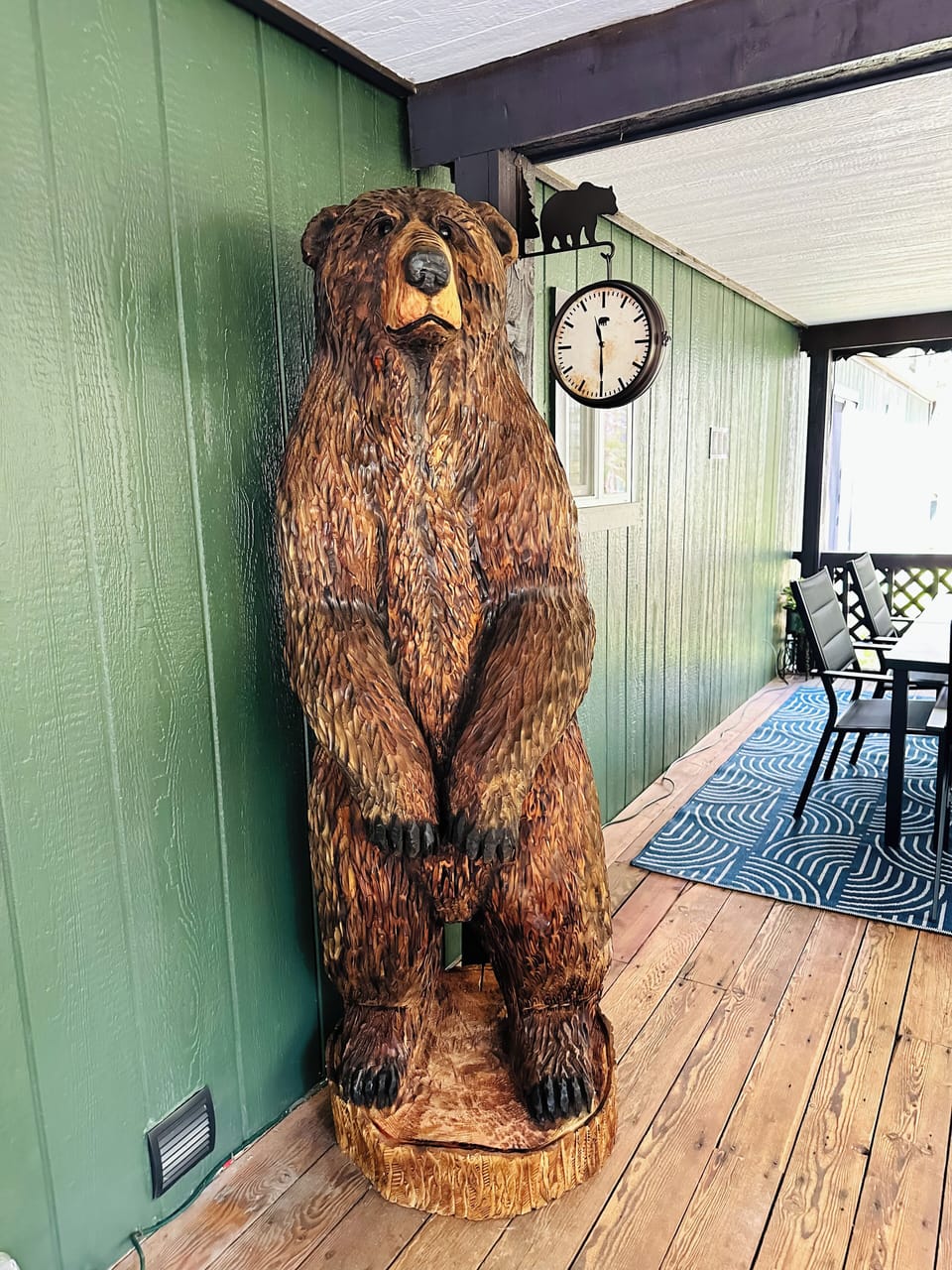 Our beautiful bear hand carved from cedar by a local artist! Perfect photo op! 