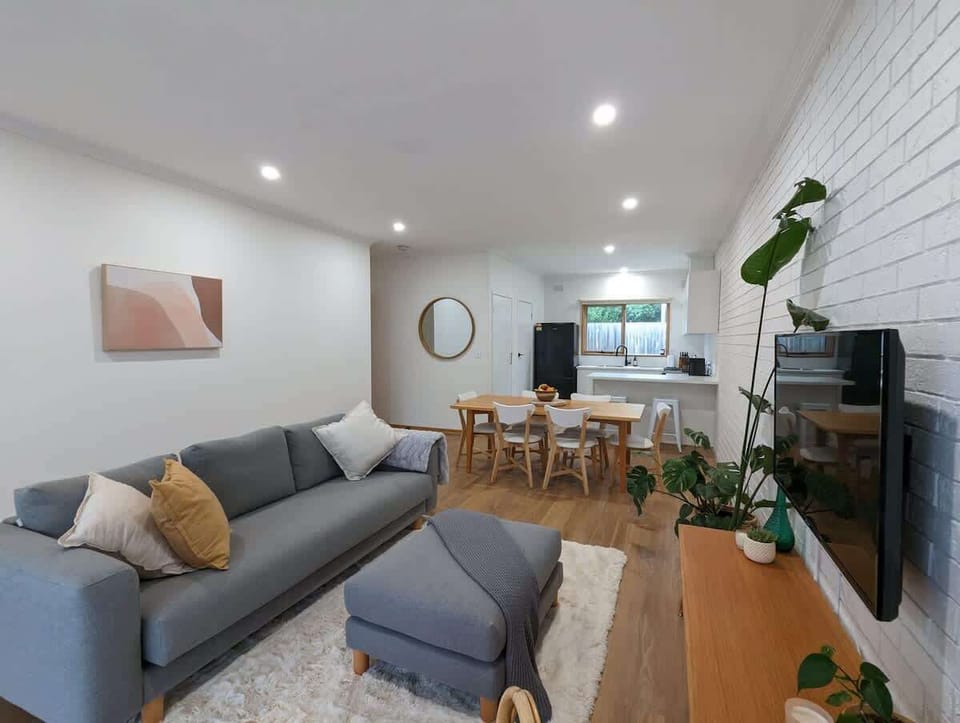 Open plan living, dining room and kitchen.