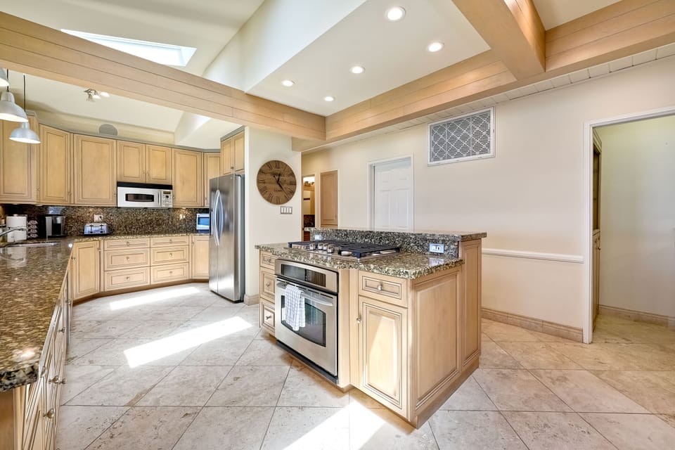 Kitchen is fully equipped with all appliances needed for a meal at home