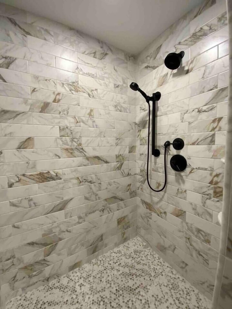Our master en-suites feature Eskiin filtered shower heads designed to remove impurities, enhance water pressure, and create a more relaxing, spa-like shower experience.