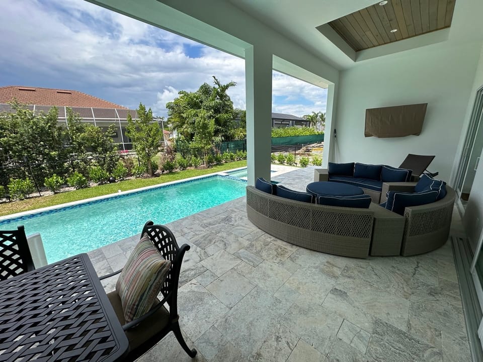 Outdoor living with 2 TVs. 