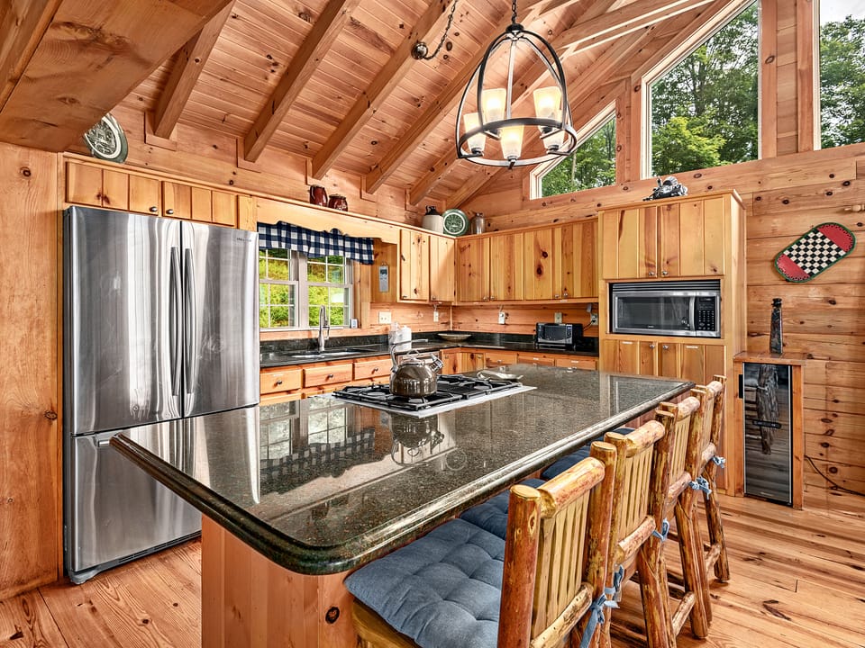 Open concept kitchen with gas stove