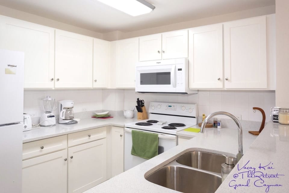 Beautiful sparkling quartz countertops. How's washing dishes with a water view?