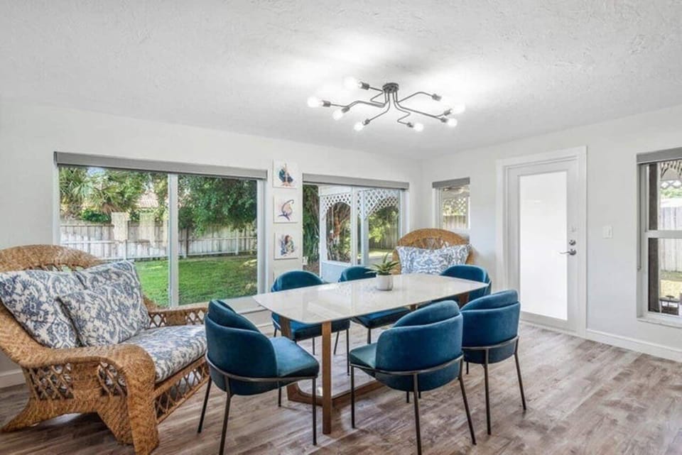 Your designated fun zone!  This dining area features a bar TV and mini fridge, plus comfy chairs to hang out. Perfect for the kids, while adults enjoy the main living room! 
