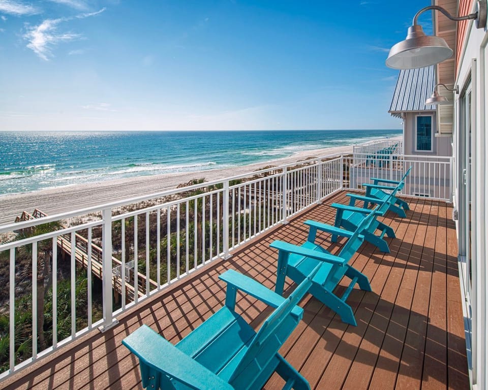 Kick back, unwind, and enjoy the gulf breeze on one of the villa’s beachfront balconies.