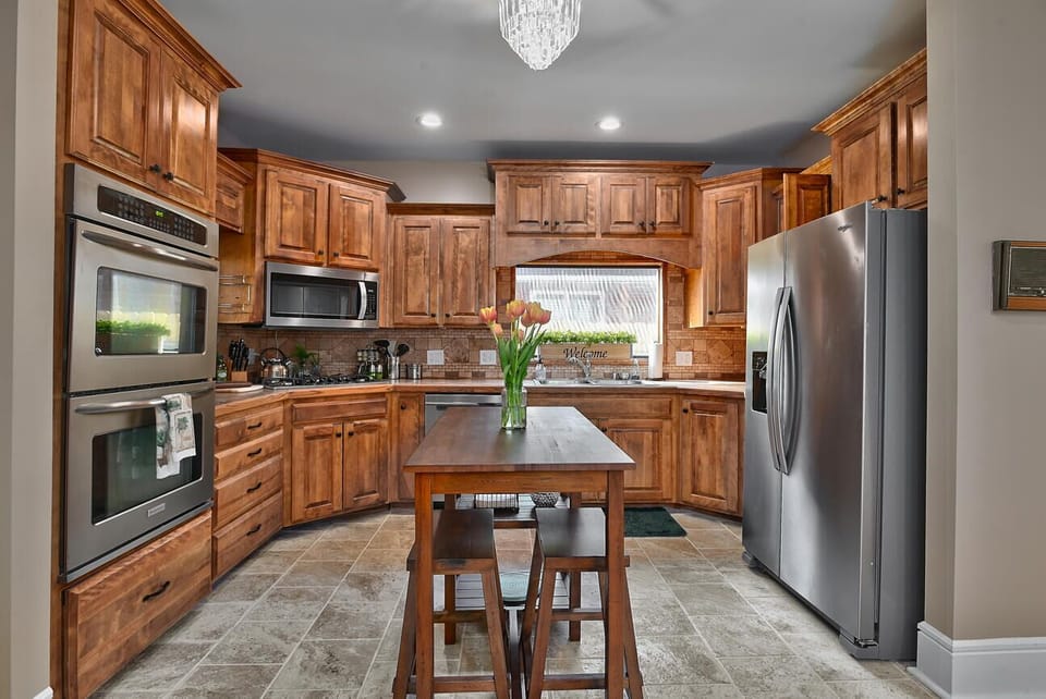 A large kitchen with professional appliances - ready to cook a big family meal.
