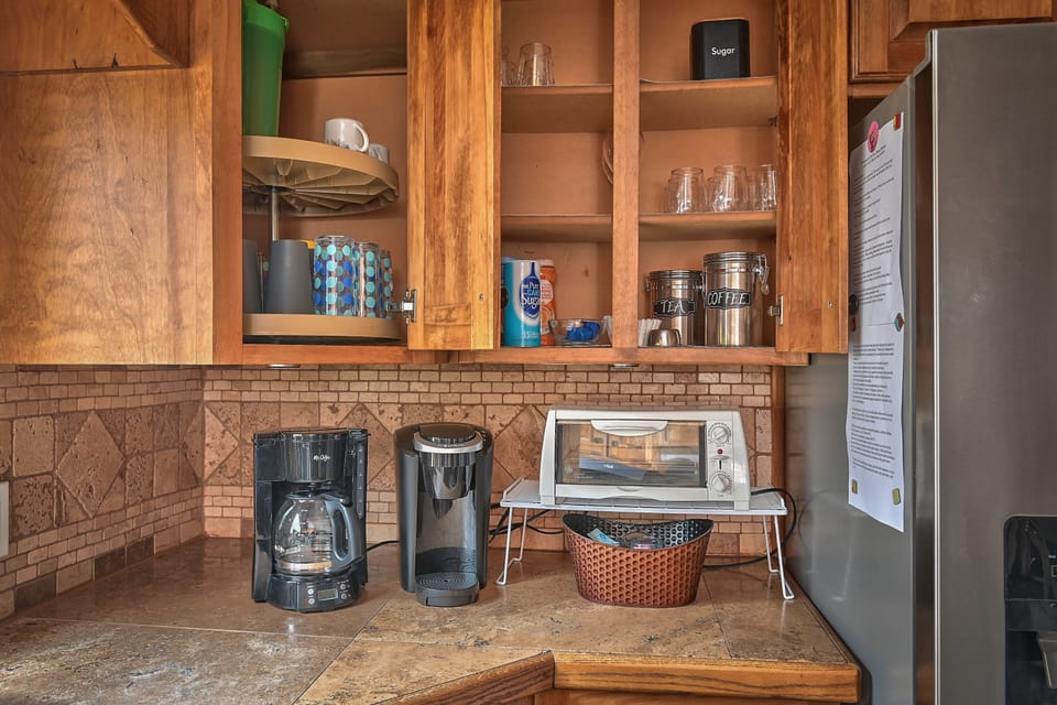 Stocked kitchen is complete with tea and coffee + all the fixings.