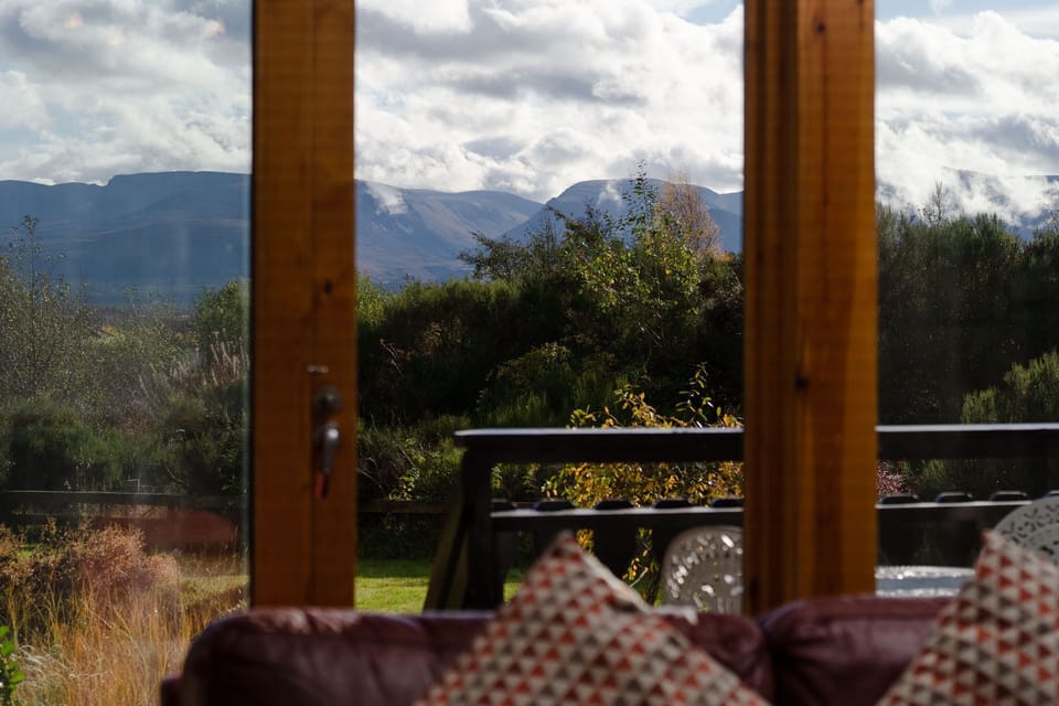 Black Grouse Lodge view to mountains from living room