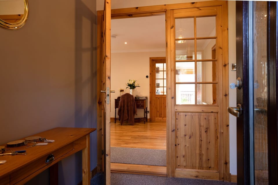 Black Grouse Lodge front door welcome