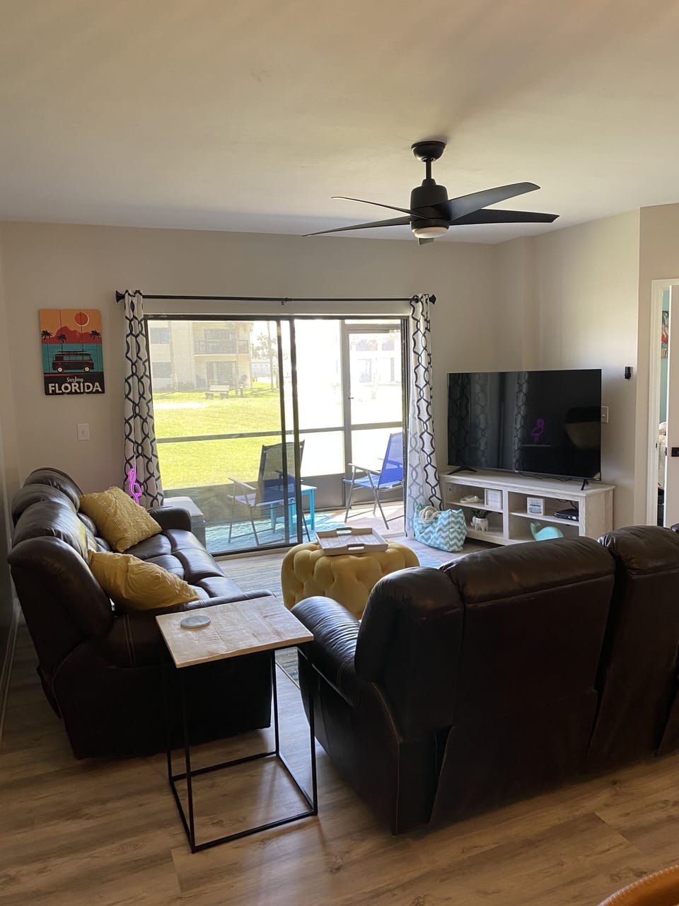 Spacious floor plan right out to our screened in patio that leads to the beach