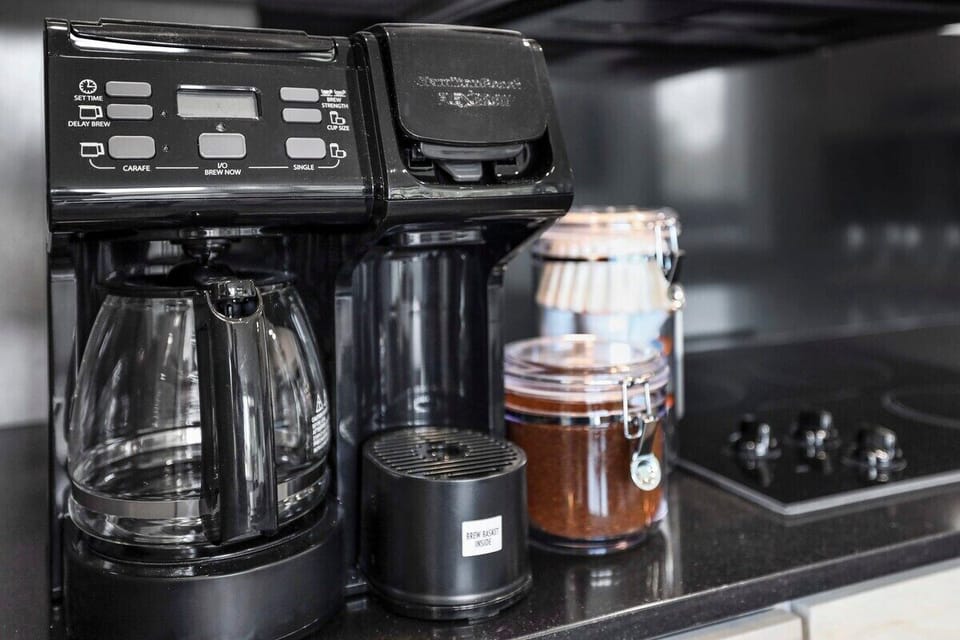 Our coffee station is fully stocked with everything you need to make the perfect cup.