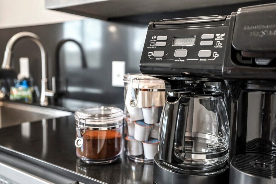 Our coffee station is fully stocked with everything you need to make the perfect cup.