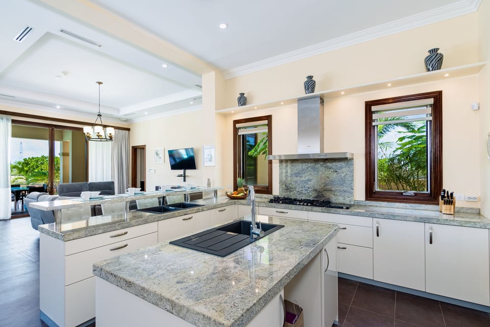 Experience culinary excellence in our state-of-the-art kitchen, where modernity meets functionality. With top-of-the-line appliances and everything you need at your fingertips, unleash your inner chef and create delicious masterpieces.