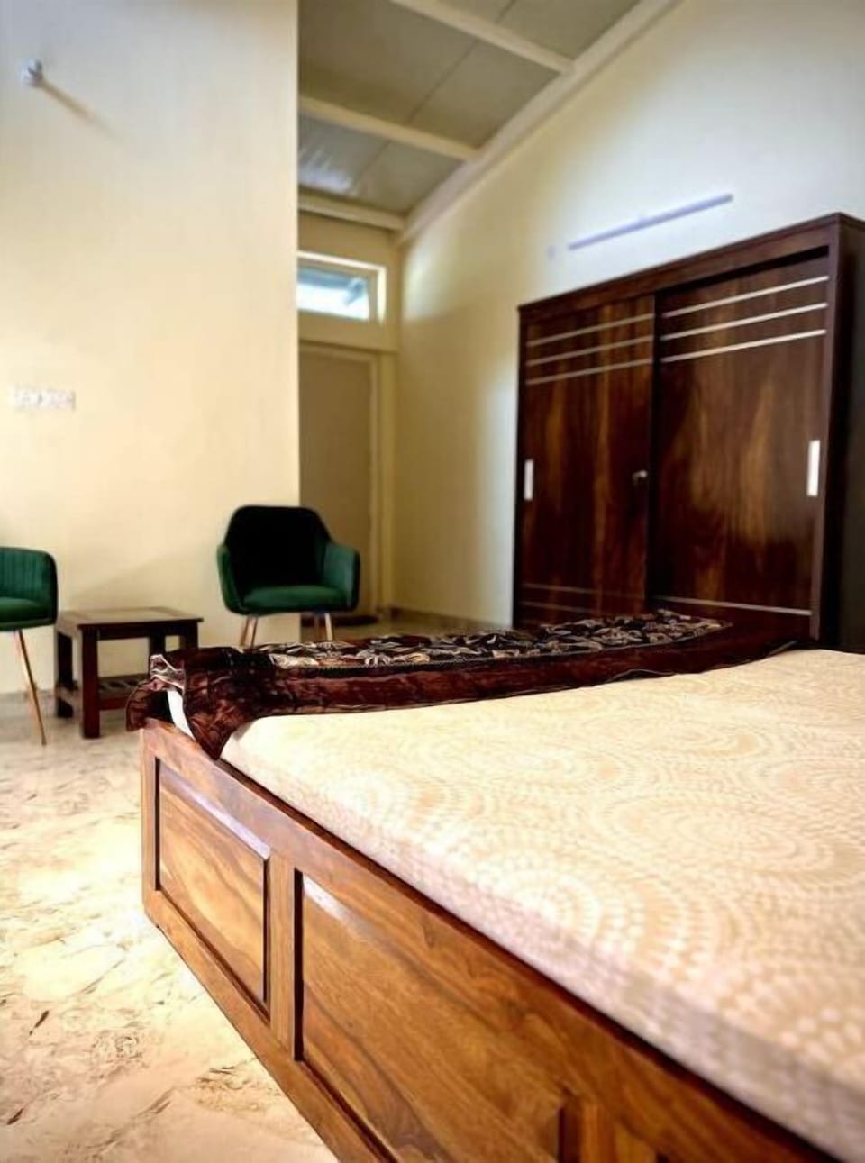 Bedroom 3 with extra large cupboard and seating.