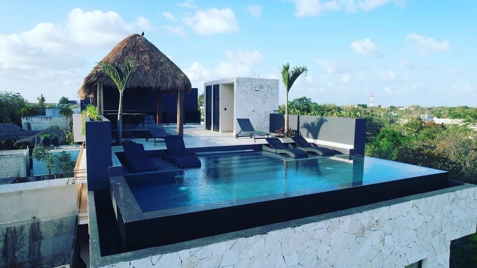Community Rooftop Pool Area Overlooking the Jungle