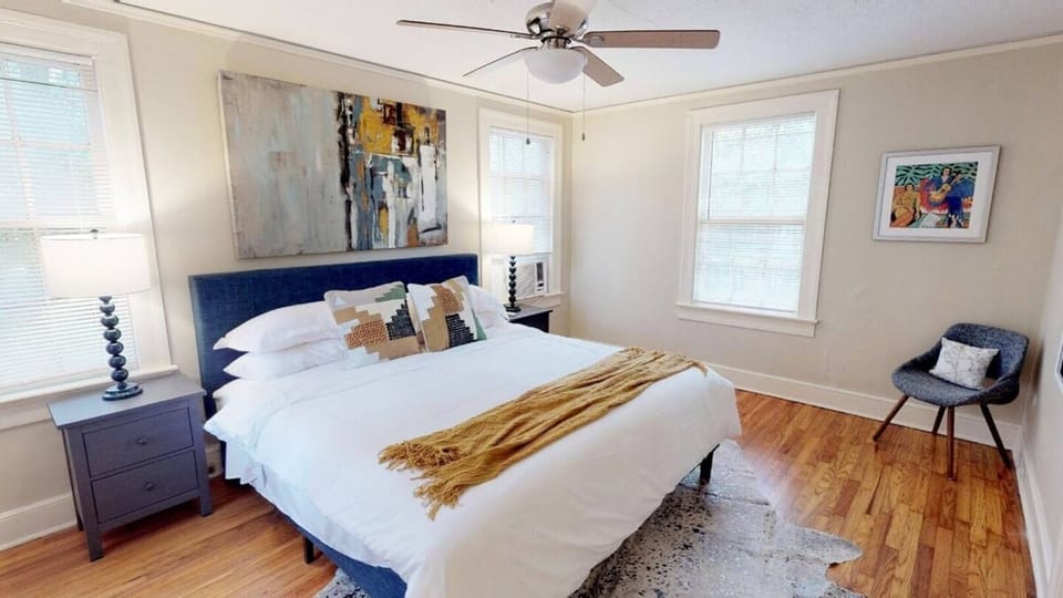 Main Bedroom with King mattress safe-rest encasement and fresh white linens.