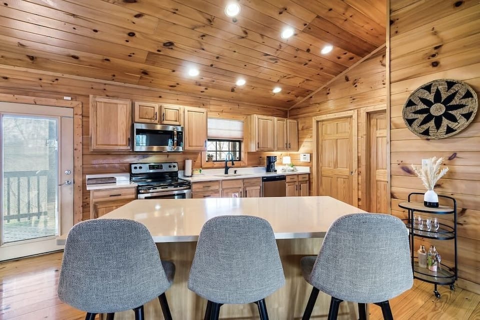 Open concept kitchen with new quartz countertops throughout